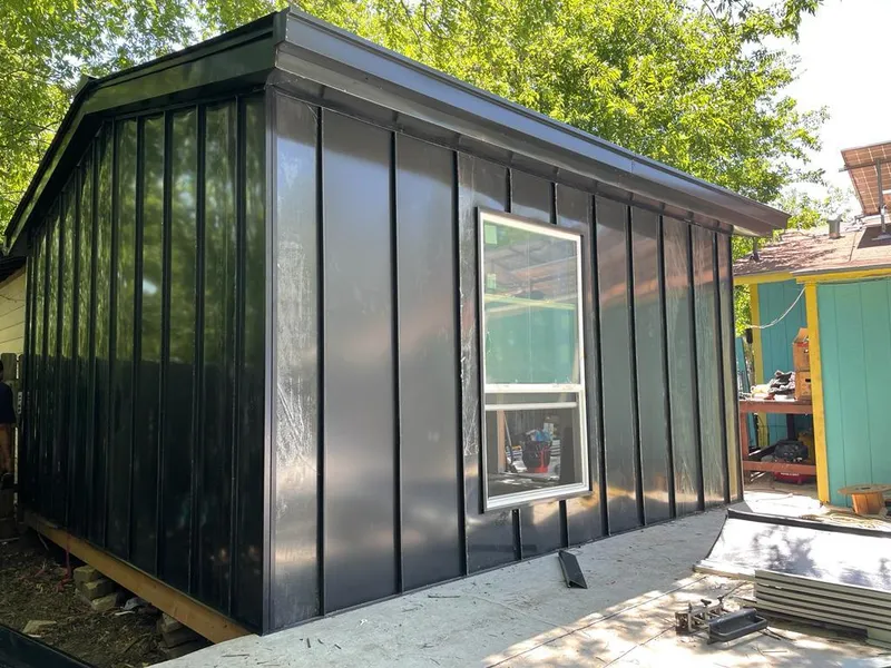 Black standing seam metal wall panels for Roof Inspection in Grandwood Park