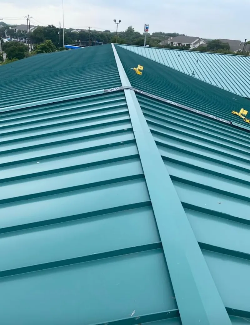 Green commercial metal roof ridge and valley for Metal Roof Repair in Grandwood Park