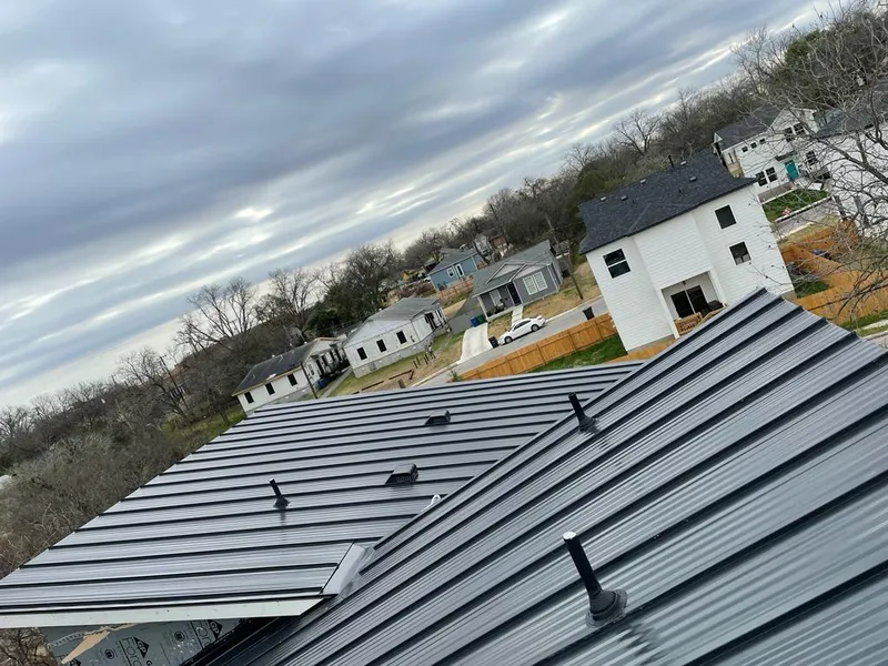 Standing seam metal roof panels with vents for Skylight Repair in Grandwood Park